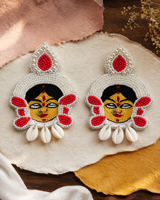 DEVI BROUGHT WHITE SHELLS