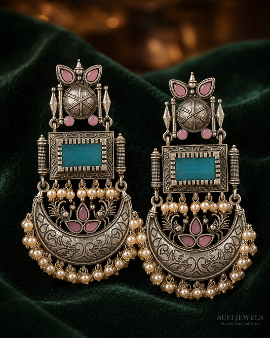 The Palace Held Stories silver-look dangler earrings with sky blue and pink stones, architectural detailing and cascading pearls.
