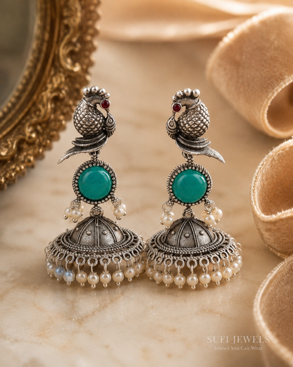 THE BIRD CARRIED BELLS