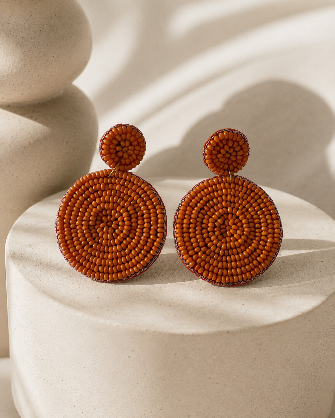 Full Circle Full Attitude orange beaded circular statement earrings by The House of SUFI.