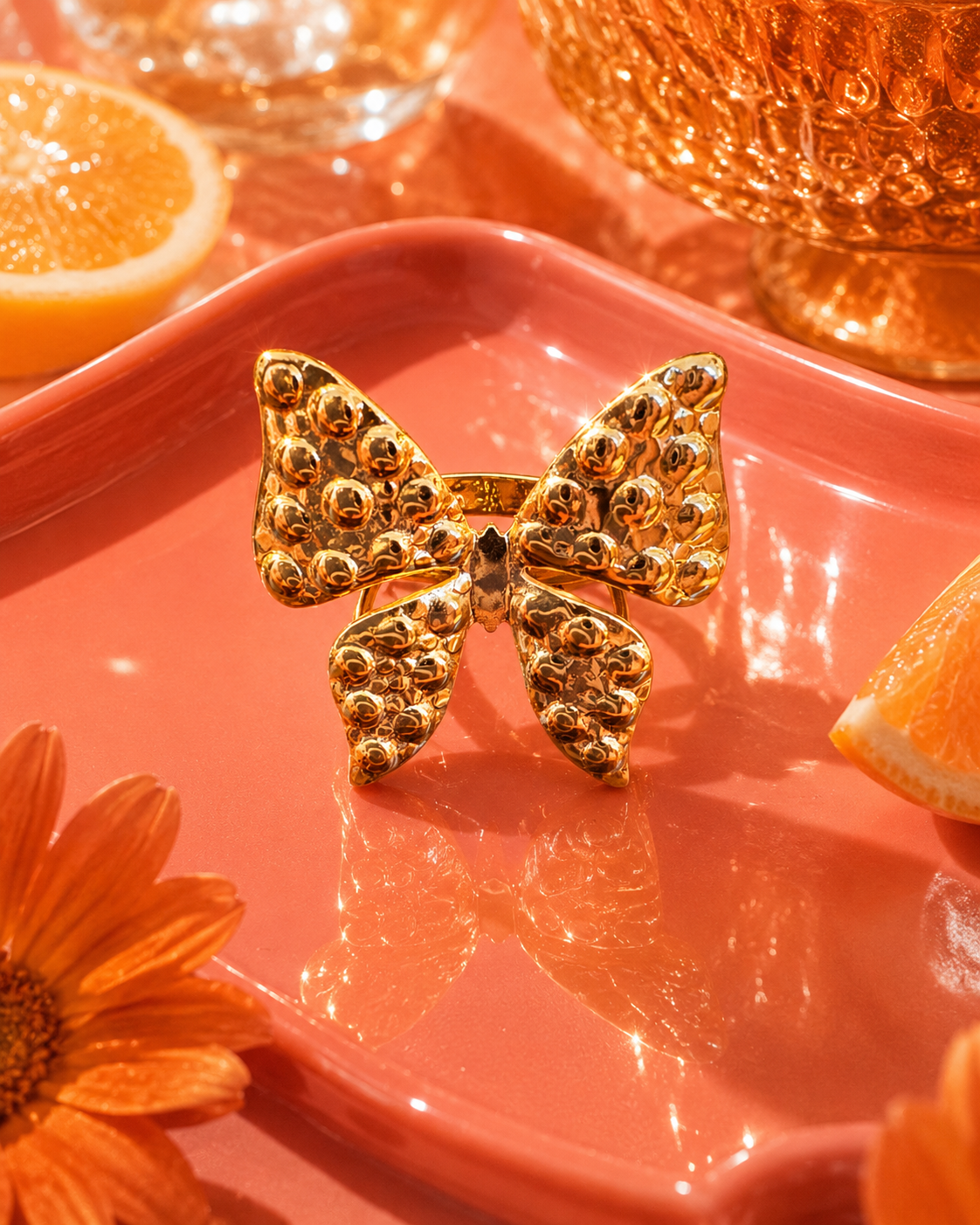 The Bow Got Bold sculptural gold-tone bow statement ring by The House of SUFI.